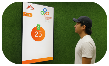 Participants enjoying the Squat Game Challenge at a corporate event in Dubai, engaging in fitness and team-building through real-time interactive squat tracking.